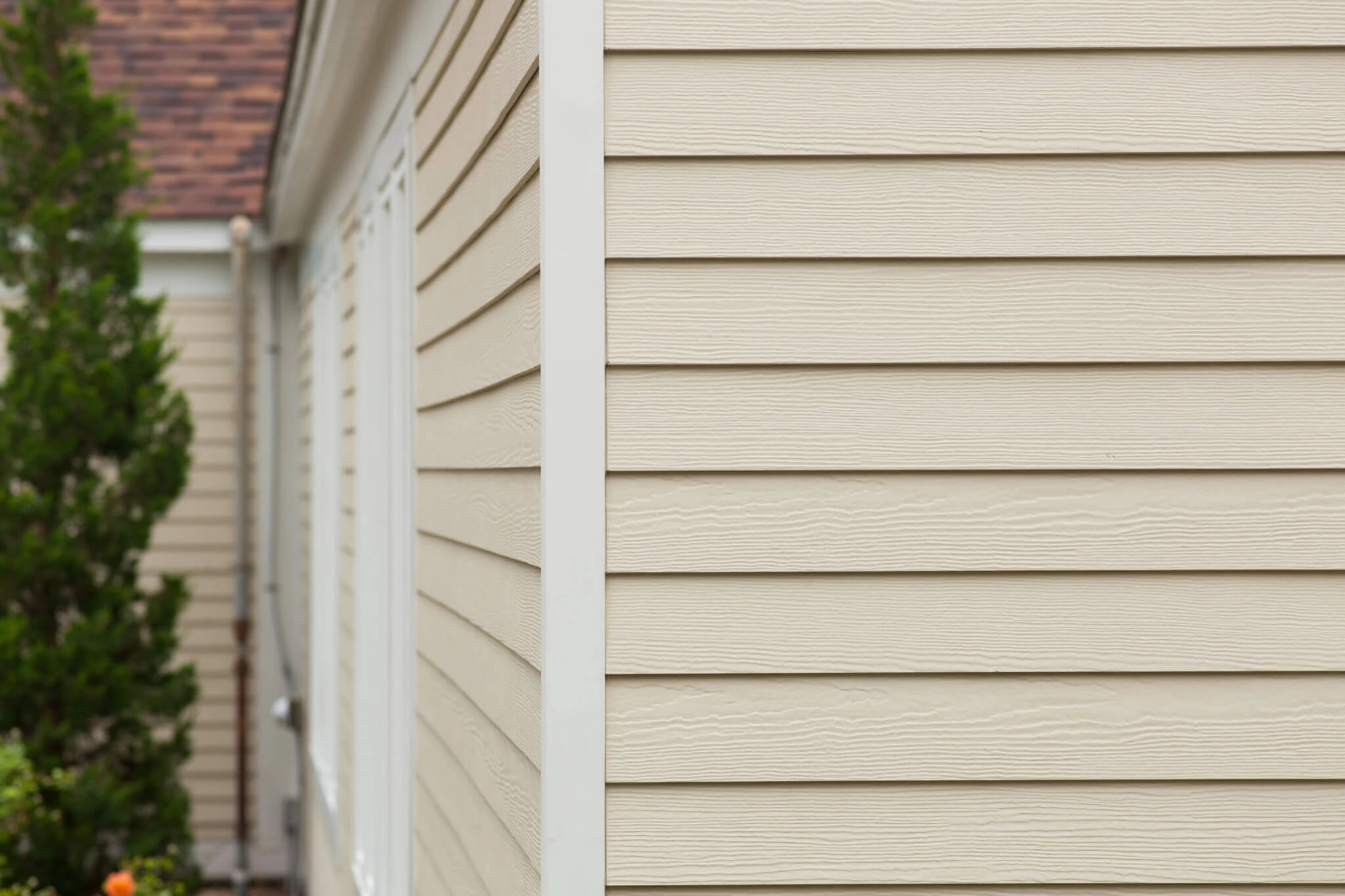 Close-up of beige siding corner on a residential home in Columbus, OH